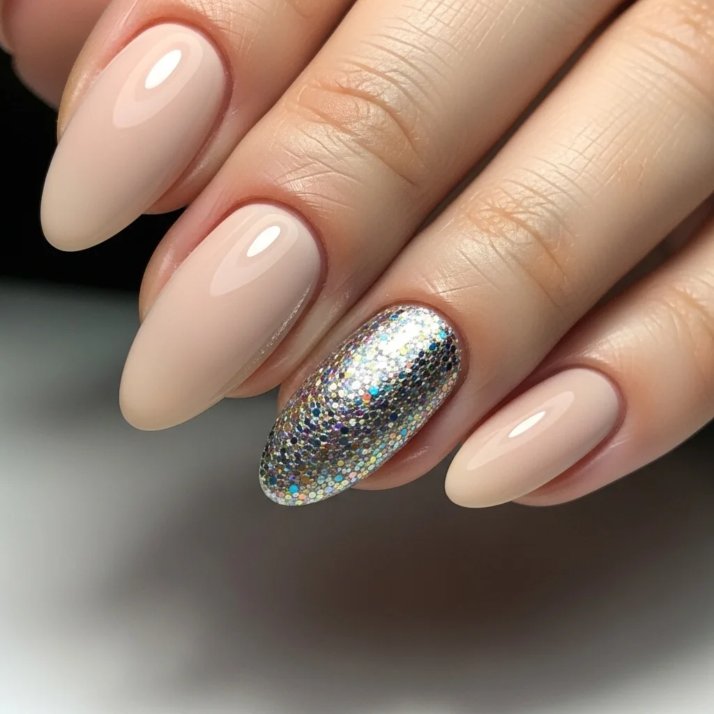 nude with glitter accent nail