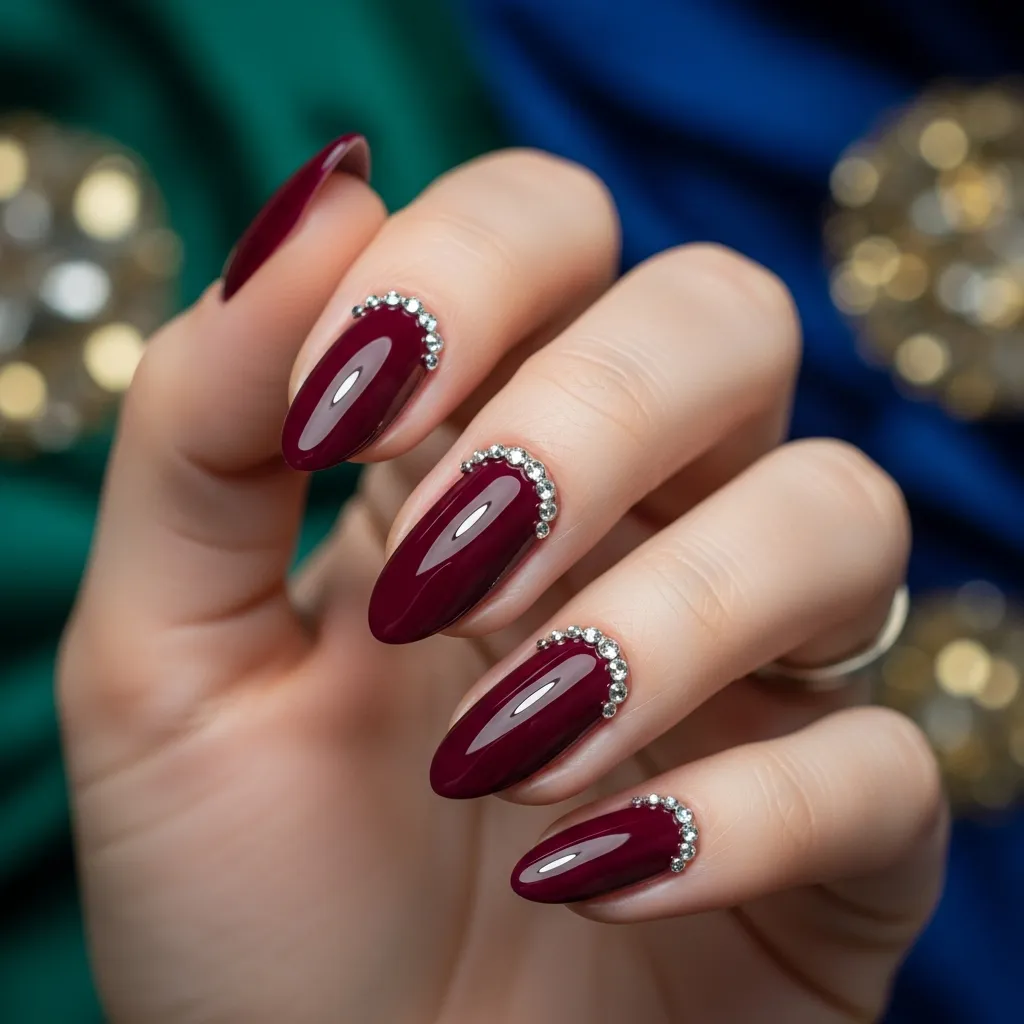 burgundy nails with rhinestone cuticles