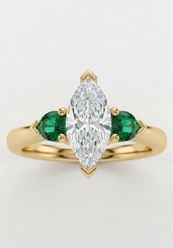 27 Captivating Marquise Engagement Ring Ideas 16 marquise-with-emerald-accents